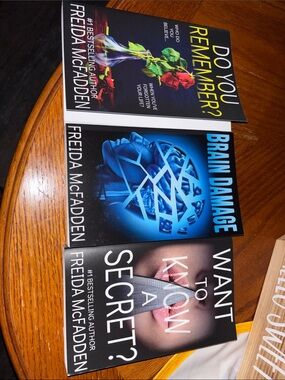 Thriller Book Set - Black, Blue, and Black Covers